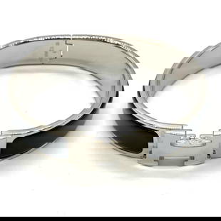 Hermes H Click Silver Bangle Cuff Black Enamel Women: Hermes H Click Silver Bangle Cuff Black Enamel Women This elegant Hermes H Click Bangle Cuff features a striking combination of black enamel and silver, making it a perfect accessory for any occasion.