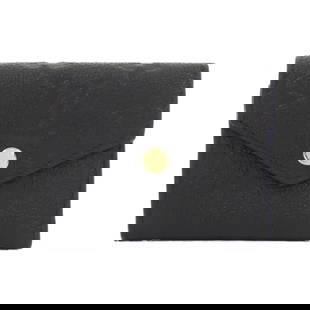 Louis Vuitton Monogram Empreinte Zoe Wallet Black Calf Leather Tri-Fold: Louis Vuitton Monogram Empreinte Zoe Wallet Black Calf Leather Tri-Fold This Louis Vuitton Monogram Empreinte Portefeuille Zoe M62935 wallet is a stylish accessory that combines luxury and functionali