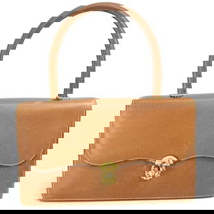 Hermes Brown Leather Handbag with Gold Hardware 15cm x 27cm: Hermes Brown Leather Handbag with Gold Hardware 15cm x 27cm This elegant Hermes handbag is crafted from premium leather in a rich brown color, making it a timeless addition to any woman's wardrobe. Wi