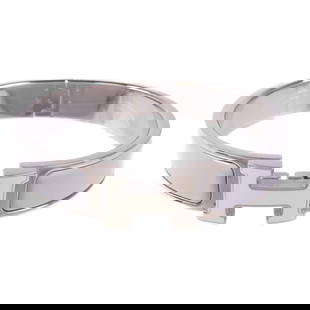 HERMES Clic H Enamel Bracelet Silver Gray and White: HERMES Clic H Enamel Bracelet Silver Gray and White Elevate your accessory collection with this exquisite HERMES Clic H Bracelet. Crafted from high-quality enamel, this stylish bracelet features a stu