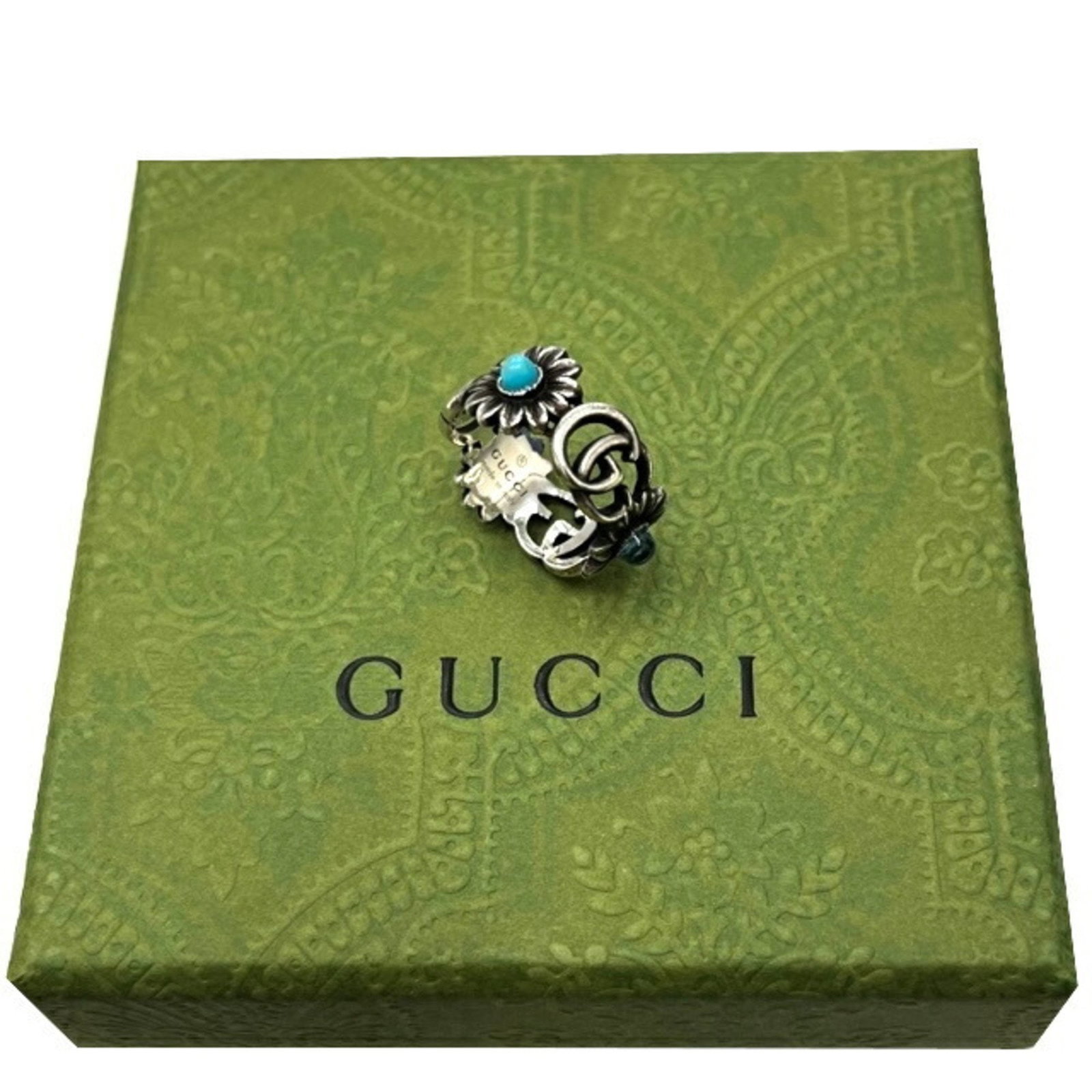 GUCCI Double G Turquoise Mother of Pearl Band Ring Silver Women: GUCCI Double G Turquoise Mother of Pearl Band Ring Silver Women Stylishly crafted, this GUCCI Double G Band Ring features a stunning combination of mother of pearl and turquoise accents. Designed for 
