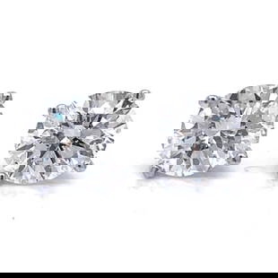 Platinum Diamond Stud Earrings 3.36 Ct E-F SI2: Platinum Diamond Stud Earrings 3.36 Ct E-F SI2 These stunning Platinum Diamond Stud Earrings feature a total diamond weight of 3.36 ct, comprising two exquisite diamonds: a 1.74 ct diamond and a 1.62