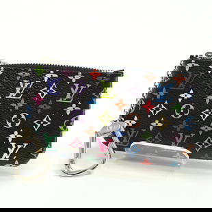 Louis Vuitton M13664 Multicolor Coin Case Pochette by Takashi Murakami: Louis Vuitton M13664 Multicolor Coin Case Pochette by Takashi Murakami This exquisite Louis Vuitton Coin Case, part of the iconic Monogram Multicolore line, is designed for women who appreciate luxury