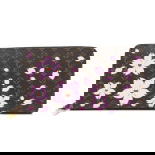 Louis Vuitton Takashi Murakami Cherry Blossom Zippy Wallet Monogram Canvas: Louis Vuitton Takashi Murakami Cherry Blossom Zippy Wallet Monogram Canvas This exquisite Louis Vuitton Zippy Wallet is a collaboration with Takashi Murakami, featuring the iconic Monogram design ador
