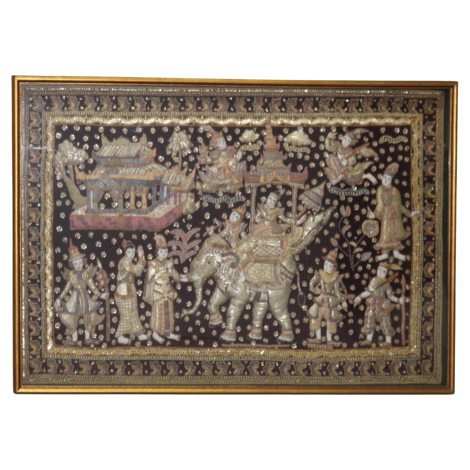 Burmese 20thC Framed Embroidered Sequined Kalaga Tapestry: Burmese 20thC Framed Embroidered Sequined Kalaga Tapestry This stunning Burmese framed embroidered and sequined Kalaga tapestry features a captivating genre scene from the 20th century. The intricate 