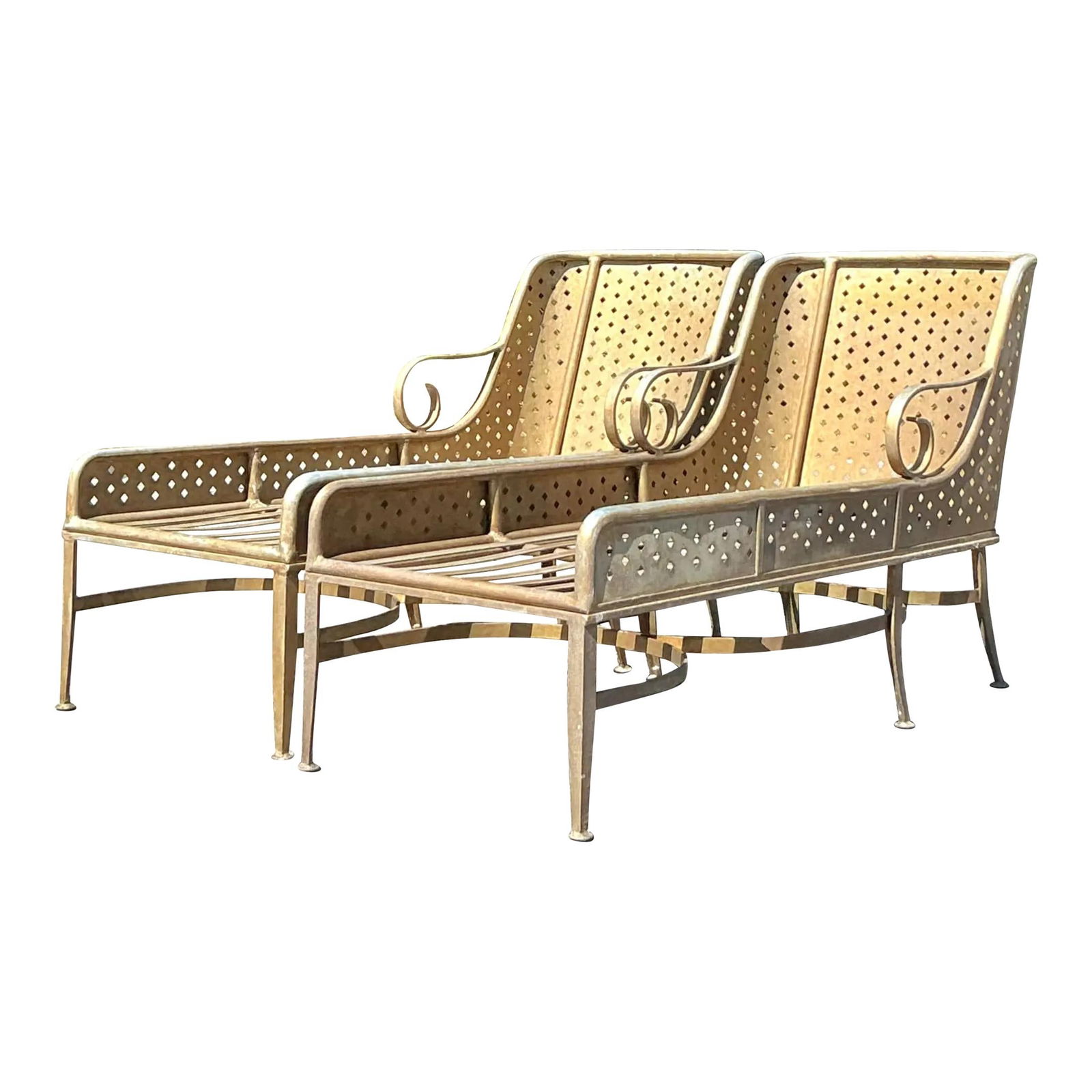 Pair of Vintage Regency Punch Cut Aluminum Chaise Lounges: Pair of Vintage Regency Punch Cut Aluminum Chaise Lounges Introducing a stunning pair of vintage Regency-style chaise lounges, masterfully crafted to infuse elegance into any space. Featuring a striki