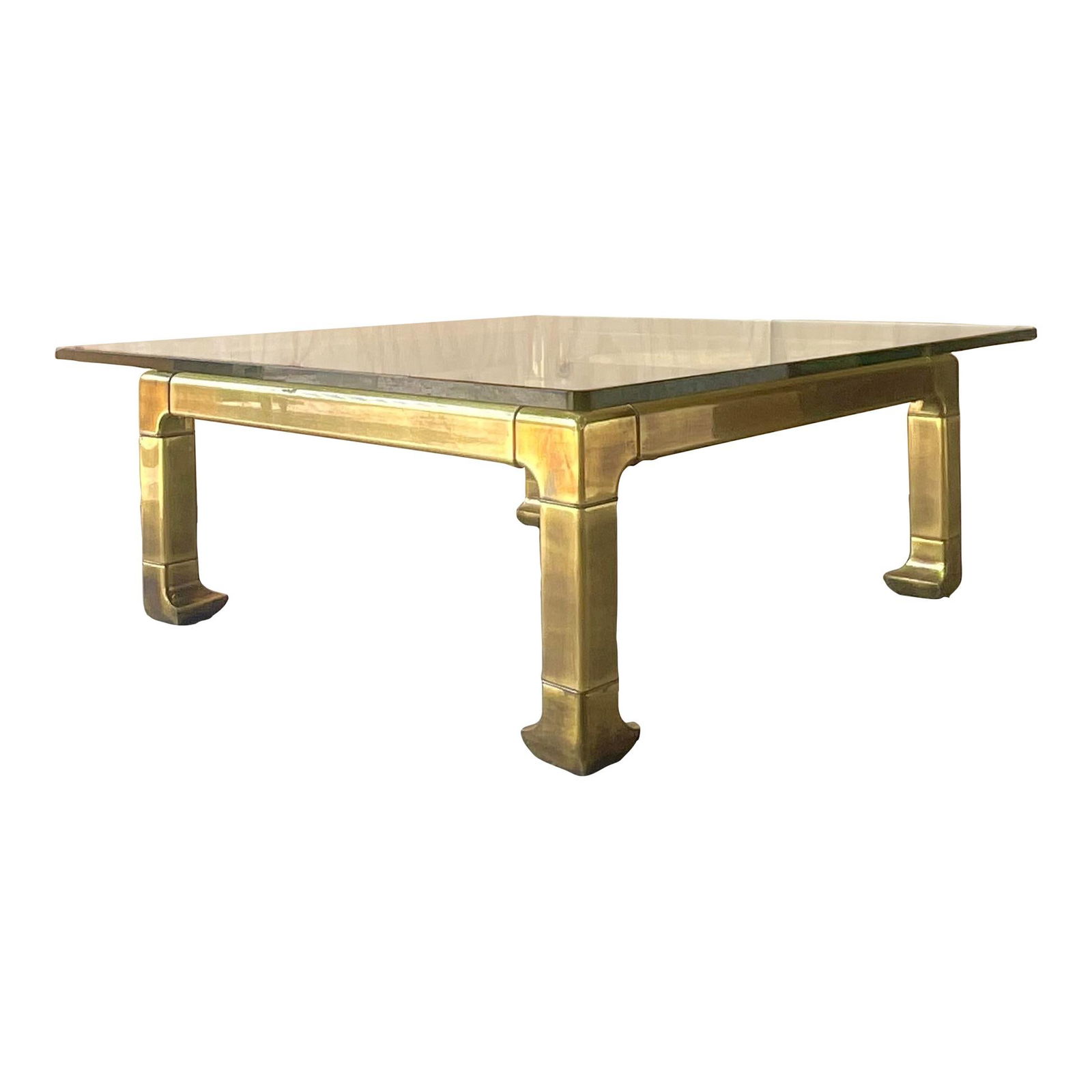 Vintage Regency Brass Coffee Table with Glass Top After Mastercraft: Vintage Regency Brass Coffee Table with Glass Top After Mastercraft This exquisite vintage Regency coffee table features a chic brass frame complemented by a thick glass top, designed in the style of