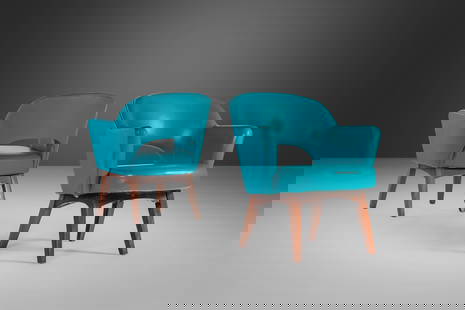 Rare 1960s Patrician Lounge Chairs in Teal Vinyl with Walnut Legs: Rare 1960s Patrician Lounge Chairs in Teal Vinyl with Walnut Legs This rare set of two lounge chairs, designed by Patrician Furniture, features original teal vinyl upholstery complemented by elegant w