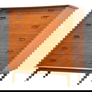 Mid Century Modern Teak Tall Dresser 44.25" 5 Drawers: Mid Century Modern Teak Tall Dresser 44.25" 5 Drawers This mid-century modern tall dresser showcases a beautiful teak finish and features five spacious drawers for ample storage. Professionally refini
