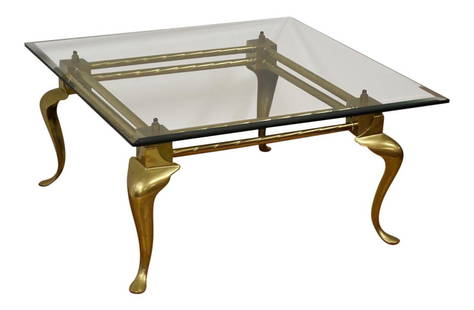 Modern Brass Glass Coffee Table with Cabriole Legs 36x36x17.5: Modern Brass Glass Coffee Table with Cabriole Legs 36x36x17.5 This modern coffee table features a stunning combination of brass and glass, showcasing elegant cabriole legs and a square beveled glass t