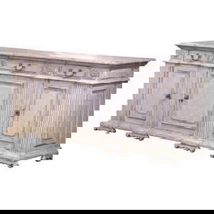 19th Century French Louis XIV Oak Buffet with 3 Doors and Drawers: 19th Century French Louis XIV Oak Buffet with 3 Doors and Drawers This exquisite 19th Century French Louis XIV buffet is a stunning example of mid-19th century craftsmanship, manufactured circa 1860 i