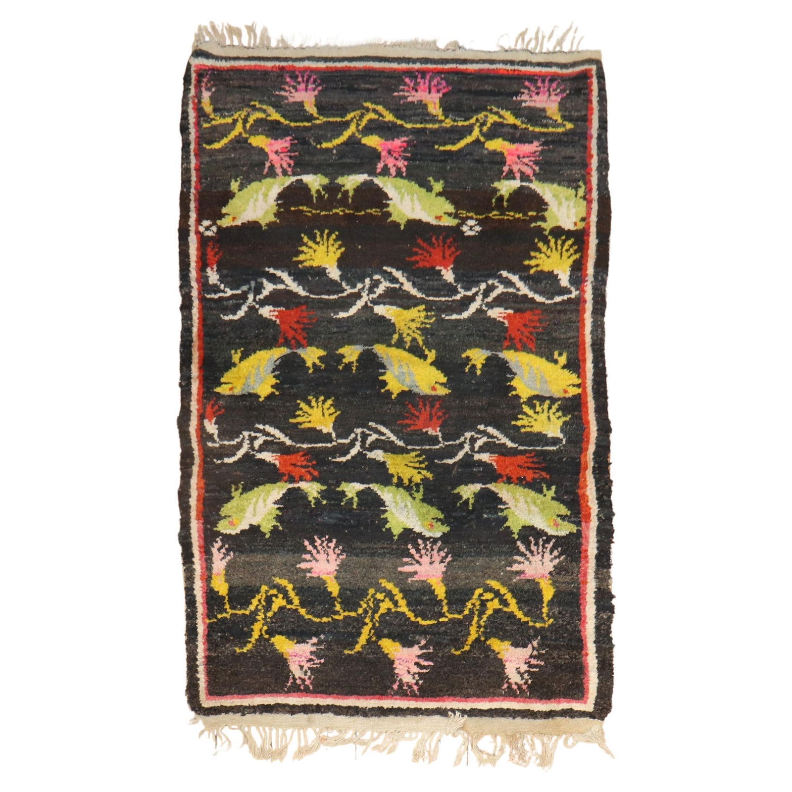 Mid-20th Century Hand-Woven Tibetan Rug with Fish Design 34 x 57: Mid-20th Century Hand-Woven Tibetan Rug with Fish Design 34 x 57 Discover the charm of this vintage Tibetan rug, featuring a captivating design of fishes gracefully surrounding a floral motif on a ric