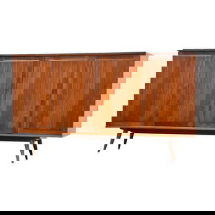 Mid-Century Modern Walnut Credenza by Founders 67" Wide: Mid-Century Modern Walnut Credenza by Founders 67" Wide This elegant mid-century modern walnut credenza features bi-folding doors and adjustable shelves, expertly crafted by Founders Furniture. Profes