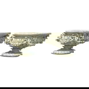 Pair of Vintage Regency Cast Concrete Rams Head Urns: Pair of Vintage Regency Cast Concrete Rams Head Urns Enhance your outdoor or indoor space with this exquisite pair of vintage cast concrete urns, showcasing elegant ram's head accents and ornate swag