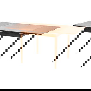 Danish Modern Teak Dining Table with Reversible Vinyl Top 56.5": Danish Modern Teak Dining Table with Reversible Vinyl Top 56.5" This Danish Modern Teak Dining Table features a mid-century design with a draw leaf mechanism that fully extends to 56.5 inches, making