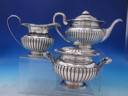 Chinese Export Sterling Silver Three-Piece Tea Set c.1840-1870: Chinese Export Sterling Silver Three-Piece Tea Set c.1840-1870 This exquisite three-piece Chinese Export Sterling Silver Tea Set, crafted by Wong Shing between 1840 and 1870, is a stunning addition to