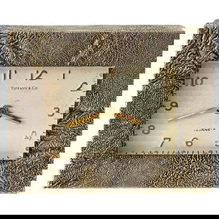 Tiffany & Co. 1960s Modern Bronze Rockwork Table Clock Swiss Movement: Tiffany & Co. 1960s Modern Bronze Rockwork Table Clock Swiss Movement This Tiffany & Co. Modern Cast Bronze 'Rockwork' Table Clock features a striking design that exemplifies 1960s modern aesthetics.