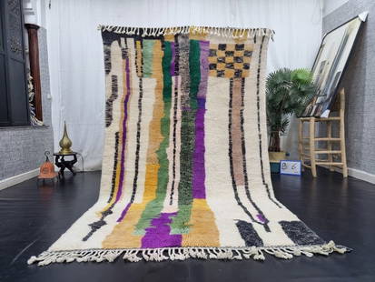 Authentic Moroccan Berber Handwoven Rug 8 x 5 Feet Wool: Authentic Moroccan Berber Handwoven Rug 8 x 5 Feet Wool Discover the beauty of an authentic, handwoven Moroccan Berber wool rug. Crafted by skilled local Berber women weavers in the Middle Atlas Mount