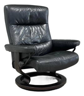 Ekornes Stressless Black Leather Reclining Chair Norway 1990s: Ekornes Stressless Black Leather Reclining Chair Norway 1990s Experience unmatched comfort with this Ekornes Stressless Reclining Lounge Chair, elegantly upholstered in black leather. The chair featur