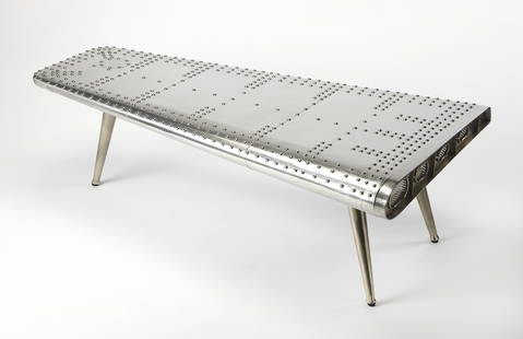 Butler Aviator Coffee Table Industrial Airplane Wing Design: Butler Aviator Coffee Table Industrial Airplane Wing Design This unique Aviator Coffee Table showcases an innovative airplane wing design, perfect for adding an industrial touch to your living space.