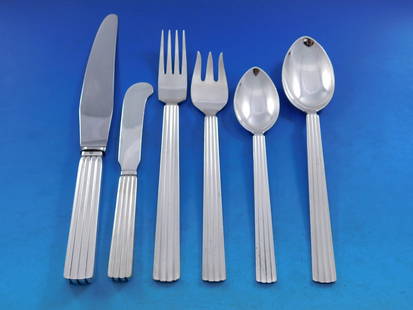 Georg Jensen Bernadotte Sterling Silver Flatware Set 36 pcs with Storage Chest: Georg Jensen Bernadotte Sterling Silver Flatware Set 36 pcs with Storage Chest Discover the elegance of the Bernadotte flatware set by Georg Jensen, a remarkable collection that showcases the timeless