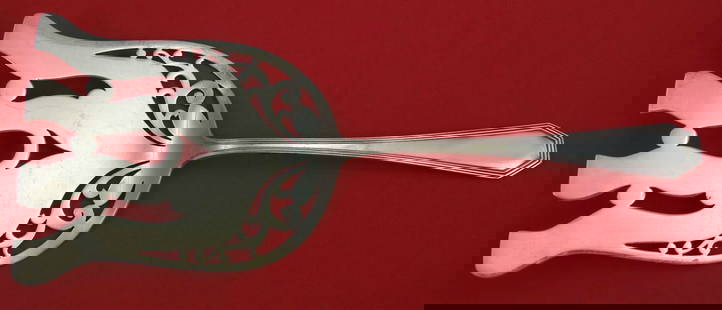 Dominick & Haff Queen Anne Plain Sterling Silver Asparagus Fork 9 7/8": Dominick & Haff Queen Anne Plain Sterling Silver Asparagus Fork 9 7/8" This exquisite asparagus fork features a classic Queen Anne design by Dominick & Haff, crafted from high-quality sterling silver.