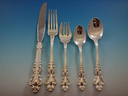Reed & Barton Spanish Baroque Sterling Silver Flatware Set 64 Pieces: Reed & Barton Spanish Baroque Sterling Silver Flatware Set 64 Pieces Experience the elegance of the Spanish Baroque Sterling Silver Flatware Set by Reed & Barton. This luxurious 64-piece dinner set fe