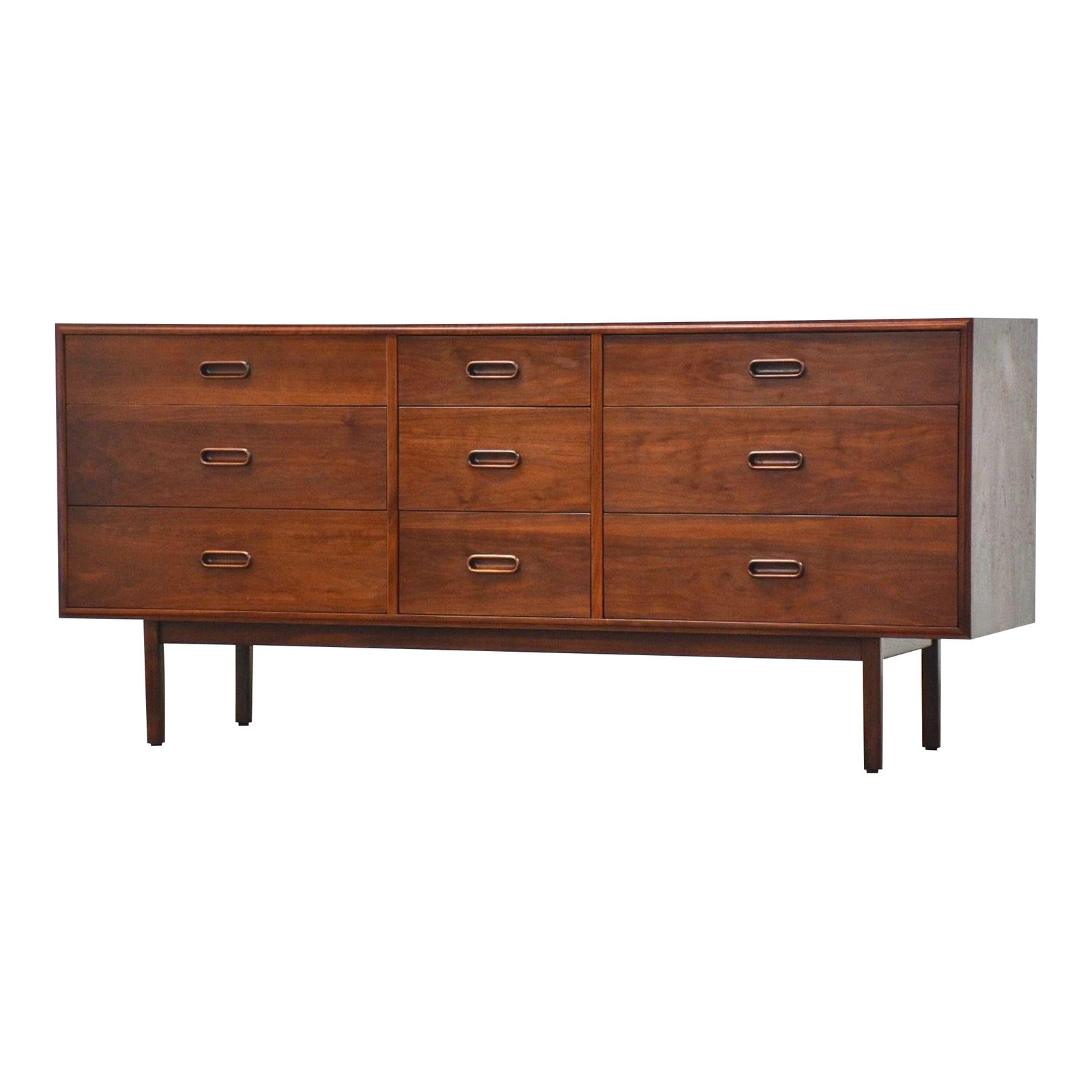 1960s Jack Cartwright Walnut Dresser 67 x 18 x 30.25 Mid-Century Modern: 1960s Jack Cartwright Walnut Dresser 67 x 18 x 30.25 Mid-Century Modern This striking mid-century modern dresser, designed by Jack Cartwright for Founders, features a sleek walnut finish and nine spac
