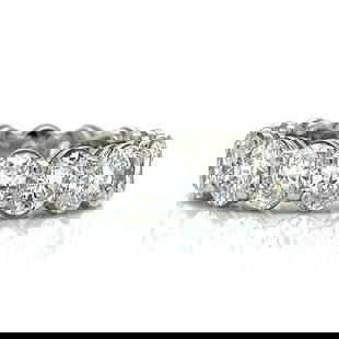 Platinum 9.00 Ct Diamond Eternity Band with 14 Oval Diamonds: Platinum 9.00 Ct Diamond Eternity Band with 14 Oval Diamonds This exquisite Platinum Diamond Eternity Band features 14 oval-shaped diamonds, totaling approximately 9.00 carats. With a stunning F-H col