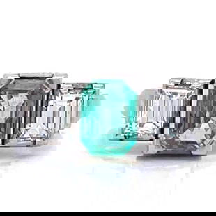 Stunning Platinum 1.03 Ct Emerald & 0.55 Ct Diamond Ring: Stunning Platinum 1.03 Ct Emerald & 0.55 Ct Diamond Ring This exquisite ring features a stunning 1.03 Ct. emerald, beautifully complemented by two diamonds with a total weight of approximately 0.55 Ct