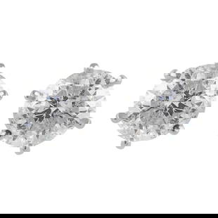 EGL Certified 2.38ct Round Diamond Stud Earrings in 14k White Gold: EGL Certified 2.38ct Round Diamond Stud Earrings in 14k White Gold Elevate your style with these exquisite EGL Certified diamond stud earrings. Featuring two matching round brilliant diamonds with a t