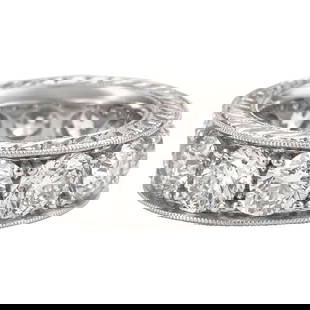 8.56ct Round Cut Diamond Eternity Band in 18k White Gold Size 5.75: 8.56ct Round Cut Diamond Eternity Band in 18k White Gold Size 5.75 This stunning 8.56 Carat Round Cut Diamond Eternity Band is set in luxurious 18 Karat White Gold. Featuring 12 round brilliant diamon