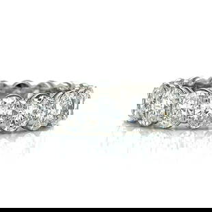 Platinum Eternity Band 5.75 Ct Oval Diamond 17 Stones: Platinum Eternity Band 5.75 Ct Oval Diamond 17 Stones This exquisite Platinum Diamond Eternity Band features a stunning array of 17 oval diamonds, totaling approximately 5.75 carats. The diamonds boas
