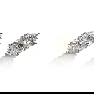 14K White Gold Diamond Stud Earrings 1.03 Carats J SI2: 14K White Gold Diamond Stud Earrings 1.03 Carats J SI2 These exquisite diamond stud earrings feature round brilliant cut diamonds with a total weight of 1.03 carats. The diamonds are rated J color and