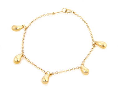 Tiffany & Co. Elsa Peretti 5 Teardrop Charms Bracelet 18k Yellow Gold: Tiffany & Co. Elsa Peretti 5 Teardrop Charms Bracelet 18k Yellow Gold This exquisite bracelet from Tiffany & Co., designed by Elsa Peretti, features five solid teardrop charms elegantly suspended from