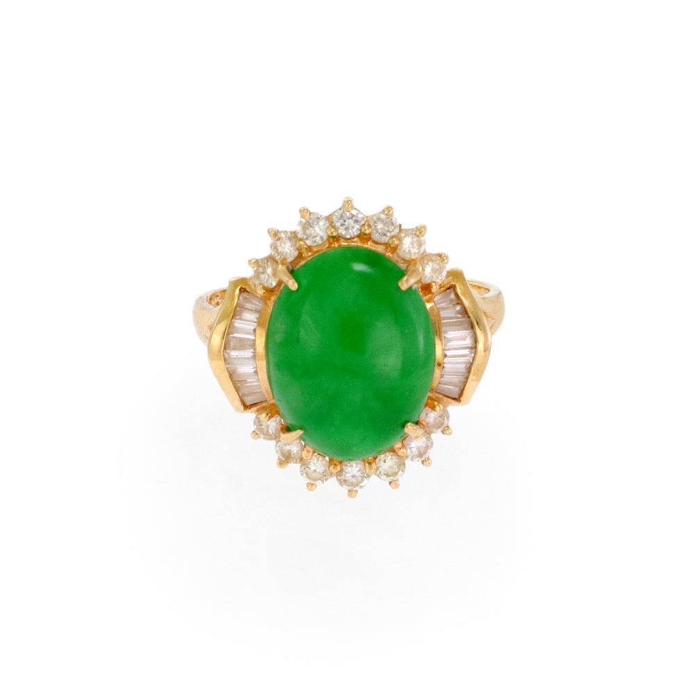 Elegant 18k Yellow Gold Diamond Jade Cocktail Ring Size 6: Elegant 18k Yellow Gold Diamond Jade Cocktail Ring Size 6 This exquisite cocktail ring features a stunning oval grass green jade stone, measuring 12.5mm long by 10mm wide, elegantly set in 18k yellow 