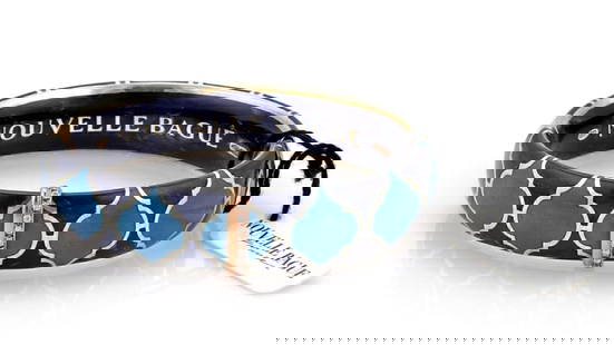 Nouvelle Bague 18k Yellow Gold Diamond Blue Enamel Bangle Bracelet: Nouvelle Bague 18k Yellow Gold Diamond Blue Enamel Bangle Bracelet Elevate your jewelry collection with this exquisite Nouvelle Bague Diamond Blue Enamel Bracelet. This luxurious bangle, crafted in It