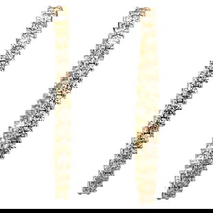 Contemporary 4.48 Carat Round Diamond Hoop Earrings in 14k Yellow Gold: Contemporary 4.48 Carat Round Diamond Hoop Earrings in 14k Yellow Gold These stunning hoop earrings feature 56 round brilliant diamonds totaling 4.48 carats, set in luxurious 14k yellow gold. With a c