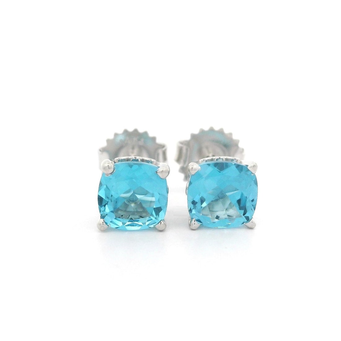 Elegant 14k White Gold 2.20CTW Cushion Blue Topaz Stud Earrings: Elegant 14k White Gold 2.20CTW Cushion Blue Topaz Stud Earrings Experience elegance with these stunning 14k White Gold Cushion Swiss Blue Topaz Stud Earrings. Each earring features a brilliant cushion