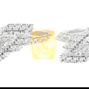 1.47ct Fancy Yellow Diamond Halo Ring 18k Gold 6.75 US EGL Certified: 1.47ct Fancy Yellow Diamond Halo Ring 18k Gold 6.75 US EGL Certified This stunning contemporary ring features a 1.47 carat Fancy Yellow cushion cut diamond, graded SI1 clarity, encircled by a halo of