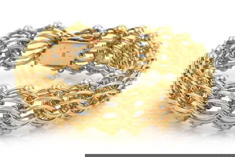 14k Yellow Gold Multi-Ring Charm Bracelet Vintage 8.25" Long: 14k Yellow Gold Multi-Ring Charm Bracelet Vintage 8.25" Long This vintage charm bracelet is crafted from 14k yellow gold and features a stunning multi-ring design, measuring 20mm in width. Its elegant