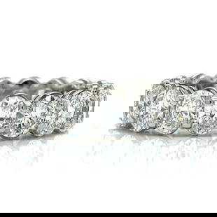 Platinum Diamond Eternity Ring 7.30 Ct with 16 Oval Diamonds: Platinum Diamond Eternity Ring 7.30 Ct with 16 Oval Diamonds This exquisite Platinum Diamond Eternity Ring features 16 oval diamonds with a total weight of approximately 7.30 ct. Each diamond boasts F