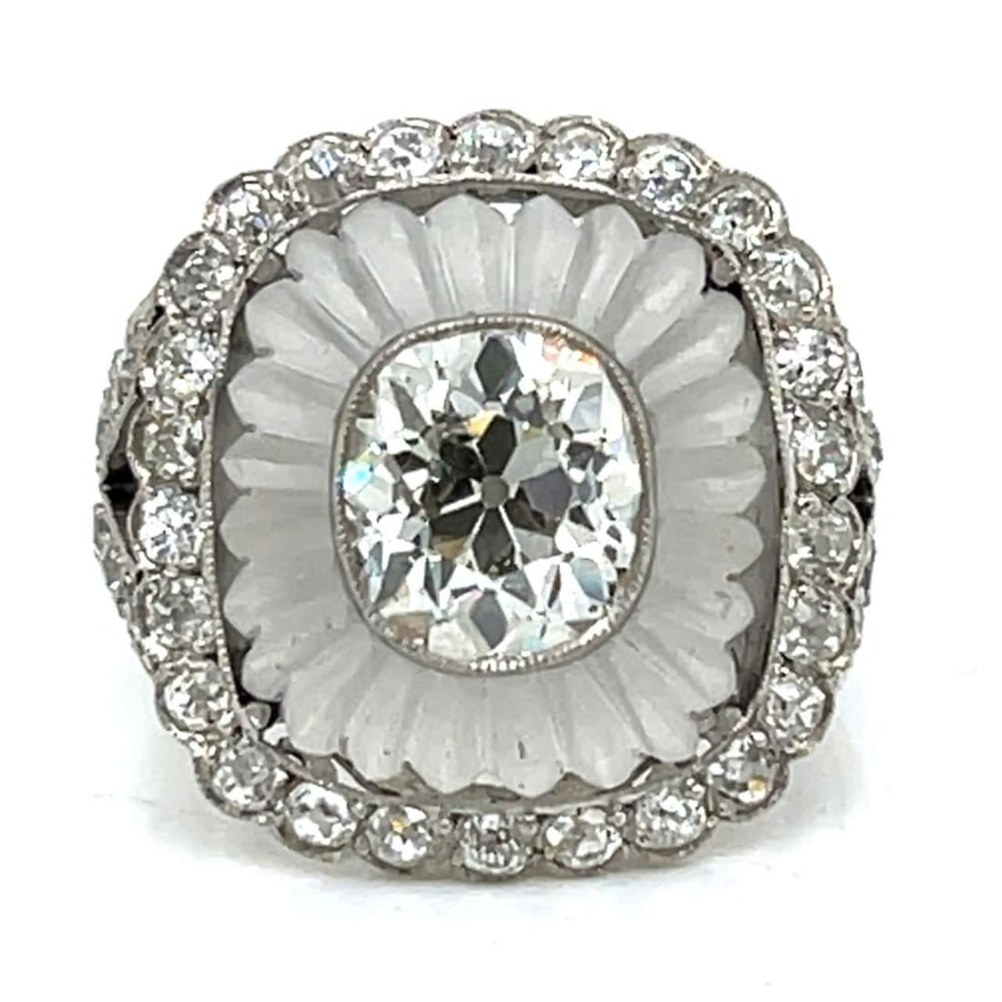 Platinum 2.81 Ct Old Cushion Diamond Ring with 42 Old Mine Diamonds: Platinum 2.81 Ct Old Cushion Diamond Ring with 42 Old Mine Diamonds Exquisite platinum ring featuring a stunning 2.81 Ct. old cushion-cut diamond, complemented by 42 old mine diamonds totaling approxi
