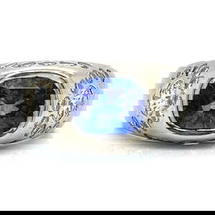 Elegant 18K White Gold GIA Certified Sapphire Diamond Ring: Elegant 18K White Gold GIA Certified Sapphire Diamond Ring This exquisite 18K White Gold ring showcases a stunning GIA Certified 3.70 Ct. Sapphire, complemented by two GIA Certified Diamonds of 0.50 C