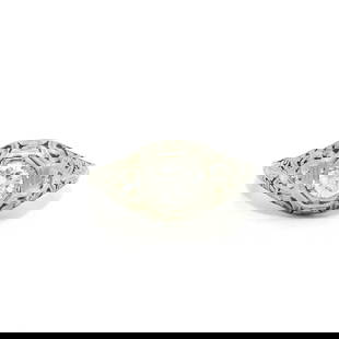 Antique Art Deco 18k White Gold .53ct Diamond Floral Engagement Ring: Antique Art Deco 18k White Gold .53ct Diamond Floral Engagement Ring This exquisite antique Art Deco engagement ring features a stunning .53ct diamond with a brilliant cut, set in solid 18k white gold