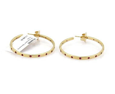 Ippolita Glamazon Deep Pink Sapphire 18k Yellow Gold Hoop Earrings: Ippolita Glamazon Deep Pink Sapphire 18k Yellow Gold Hoop Earrings Enhance your jewelry collection with the Ippolita Glamazon Stardust Deep Pink Sapphire Hoop Earrings. These exquisite earrings featur