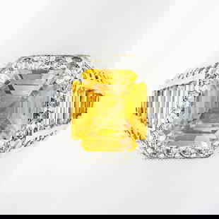 Vintage 18K White Gold GIA 4.05ct Orangy Yellow Sapphire Diamond Cocktail Ring: Vintage 18K White Gold GIA 4.05ct Orangy Yellow Sapphire Diamond Cocktail Ring This exquisite vintage cocktail ring showcases a stunning 4.05 carat natural orangy yellow sapphire, certified by GIA, el
