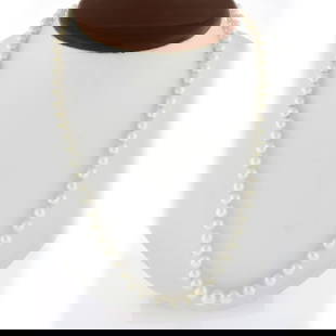 Vintage Graduated Cultured Pearl Necklace 18 Inch with 14k White Gold Clasp: Vintage Graduated Cultured Pearl Necklace 18 Inch with 14k White Gold Clasp This exquisite vintage necklace features a graduated strand of genuine cultured pearls, showcasing a lovely white color. The