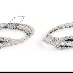 Art Deco Platinum Diamond Bracelet with Blue Sapphires 1 Carat: Art Deco Platinum Diamond Bracelet with Blue Sapphires 1 Carat This exquisite Art Deco bracelet is expertly crafted from platinum, showcasing a high polished finish. It features an elegant oval-shaped