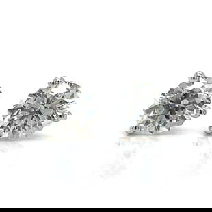 14K White Gold Diamond Stud Earrings 1.35 Ct G-H SI2-I1: 14K White Gold Diamond Stud Earrings 1.35 Ct G-H SI2-I1 These stunning 14K White Gold Diamond Stud Earrings feature two exquisite diamonds totaling approximately 1.35 carats. The diamonds are graded G